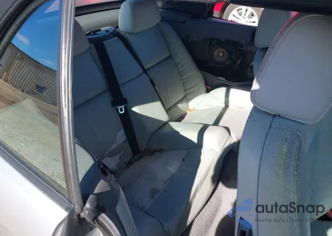 1999 BMW 323Ic z USA, uszkodzony, nr VIN WBABJ8334XEM25144